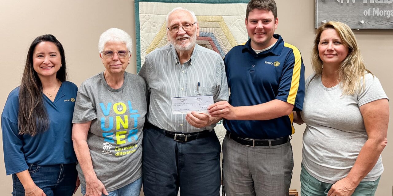 Martinsville Rotary presents check to Habitat for Humanity